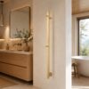 Brushed stainless steel towel warmer button control panel close-up view